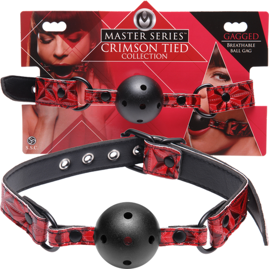 A red and black ball gag with perforations, adjustable strap, and a rolling buckle. The product is shown both in and out of its packaging.