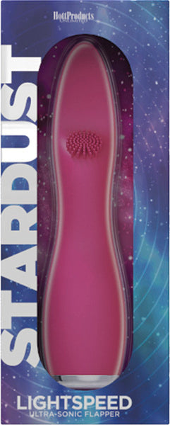 The product is a pink, sleek tongue-shaped vibrator with multiple buttons on the base for mode and intensity control, packaged in a box with 'STARDUST' and 'LIGHTSPEED' written on it.