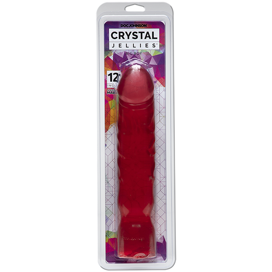 A clear, thick 12-inch dildo with a textured surface, packaged in a box. The box showcases the product in a pink hue and highlights its extra thick shaft and textured veins.