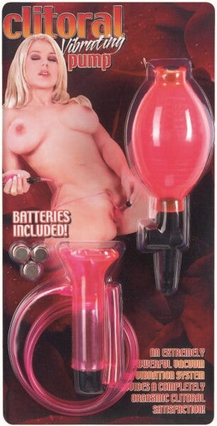The image features the Seven Creations Vibrating Clitoral Pump in pink. This adult toy is designed for clitoral stimulation, featuring a clear, bulbous pump and a small suction nozzle.