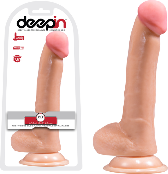A realistic flesh-colored dildo with balls, attached to a suction cup base, shown in packaging and from a side view.